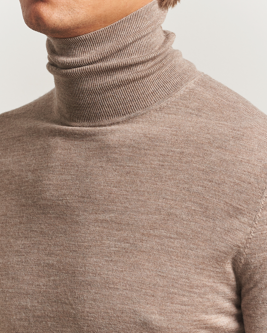 Mies | Puserot | Tiger of Sweden | Nevile Extra Fine Merino Polo Beige Melange
