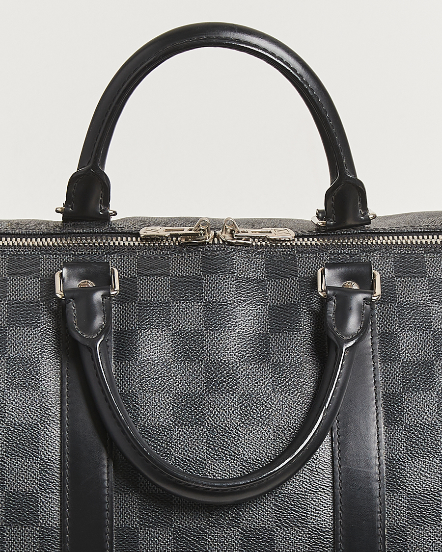 Mies | Louis Vuitton Pre-Owned Keepall Bandoulière 55 Damier Graphite | Louis Vuitton Pre-Owned | Keepall Bandoulière 55 Damier Graphite