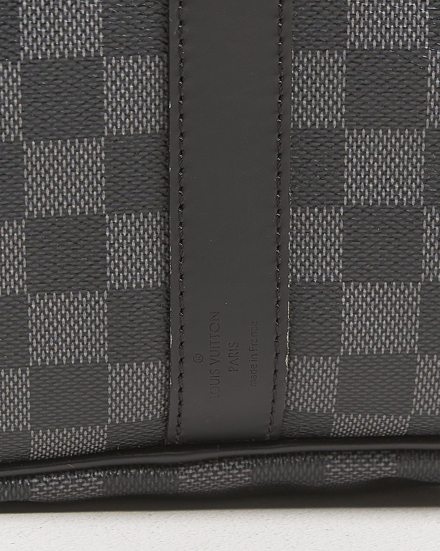 Mies | Louis Vuitton Pre-Owned Keepall Bandoulière 55 Damier Graphite | Louis Vuitton Pre-Owned | Keepall Bandoulière 55 Damier Graphite