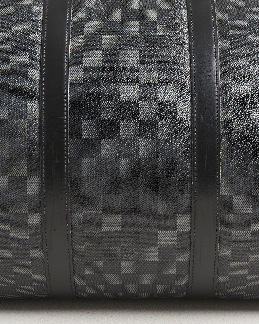 Mies | Louis Vuitton Pre-Owned Keepall Bandoulière 55 Damier Graphite | Louis Vuitton Pre-Owned | Keepall Bandoulière 55 Damier Graphite