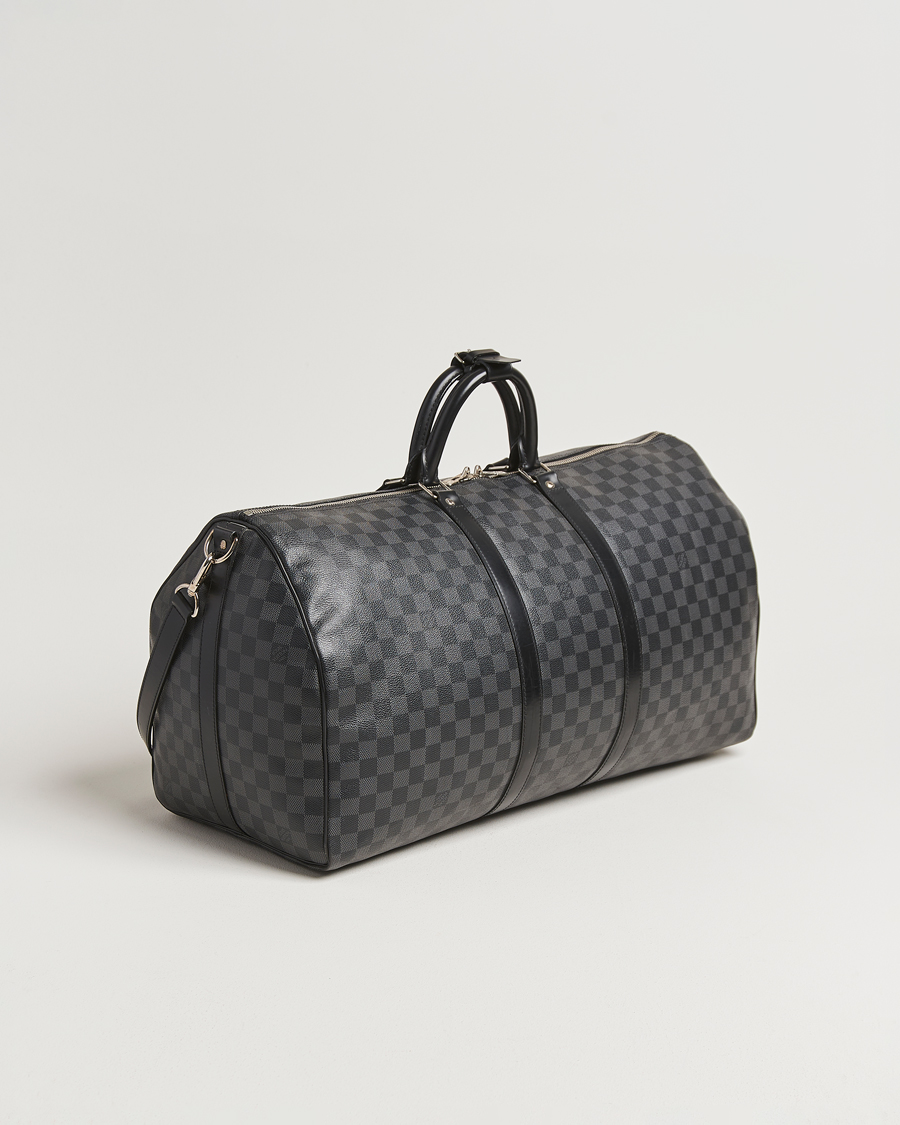 Mies | Louis Vuitton Pre-Owned Keepall Bandoulière 55 Damier Graphite | Louis Vuitton Pre-Owned | Keepall Bandoulière 55 Damier Graphite