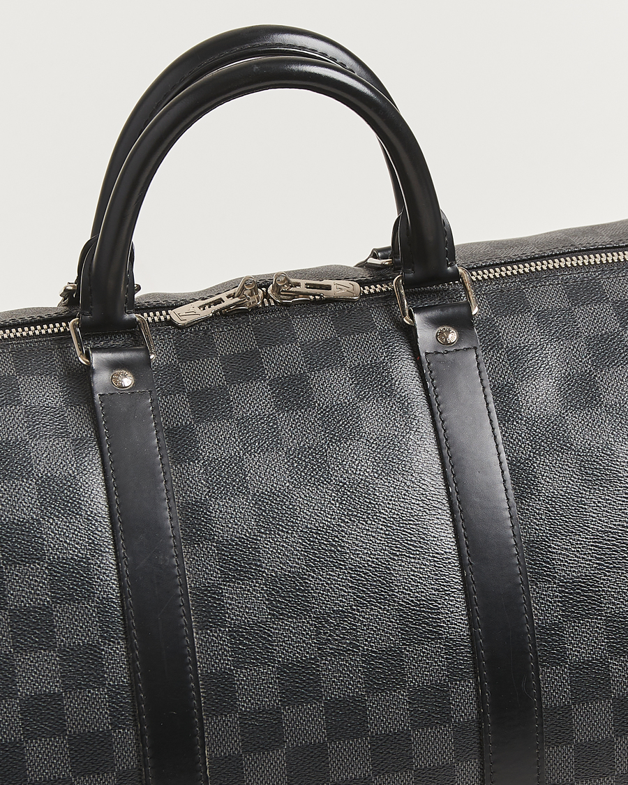 Mies | Louis Vuitton Pre-Owned Keepall Bandoulière 55 Damier Graphite | Louis Vuitton Pre-Owned | Keepall Bandoulière 55 Damier Graphite