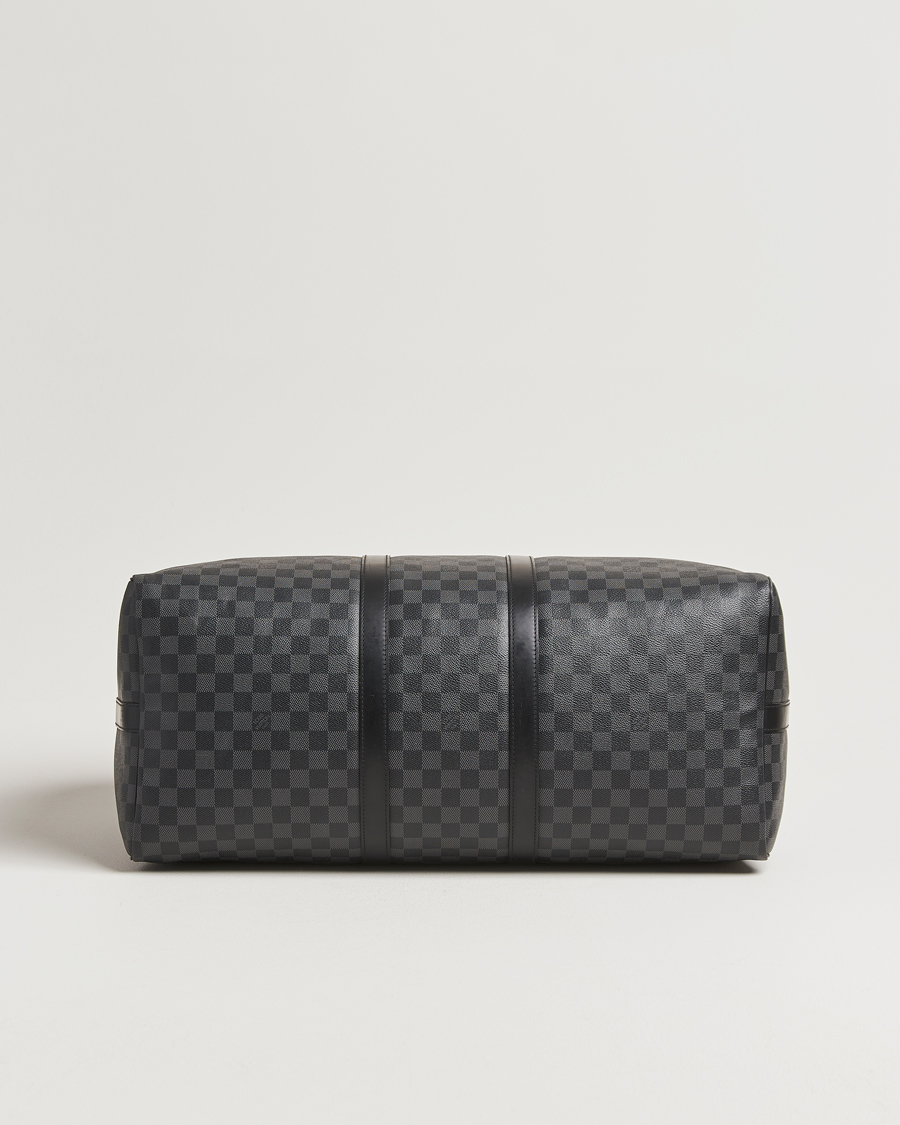Mies | Louis Vuitton Pre-Owned Keepall Bandoulière 55 Damier Graphite | Louis Vuitton Pre-Owned | Keepall Bandoulière 55 Damier Graphite