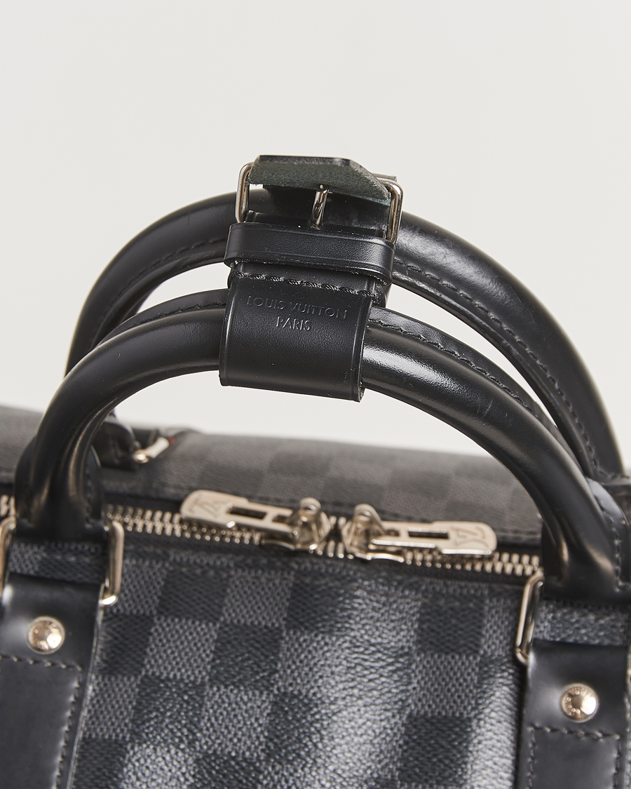 Mies | Louis Vuitton Pre-Owned Keepall Bandoulière 55 Damier Graphite | Louis Vuitton Pre-Owned | Keepall Bandoulière 55 Damier Graphite