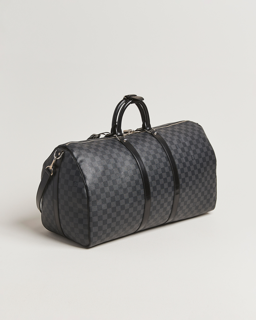 Mies | Louis Vuitton Pre-Owned Keepall Bandoulière 55 Damier Graphite | Louis Vuitton Pre-Owned | Keepall Bandoulière 55 Damier Graphite