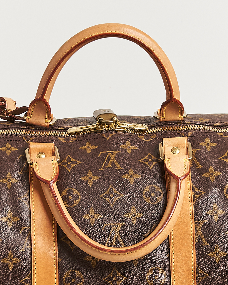 Mies | Louis Vuitton Pre-Owned Keepall Bandouliére 55 Monogram | Louis Vuitton Pre-Owned | Keepall Bandouliére 55 Monogram