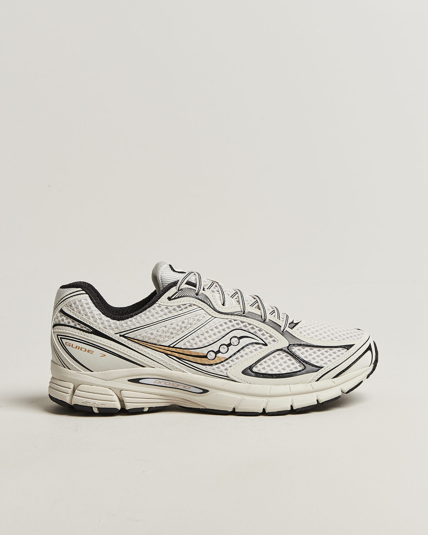 Mies | Tennarit | Saucony | Guide 7 Running Sneaker Onyx/Gold