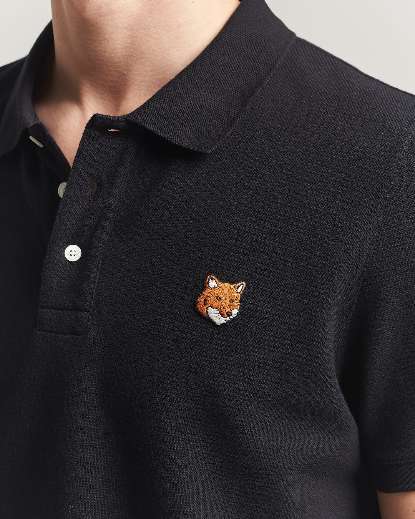 Mies | Pikeet | Maison Kitsuné | Fox Head Polo Black