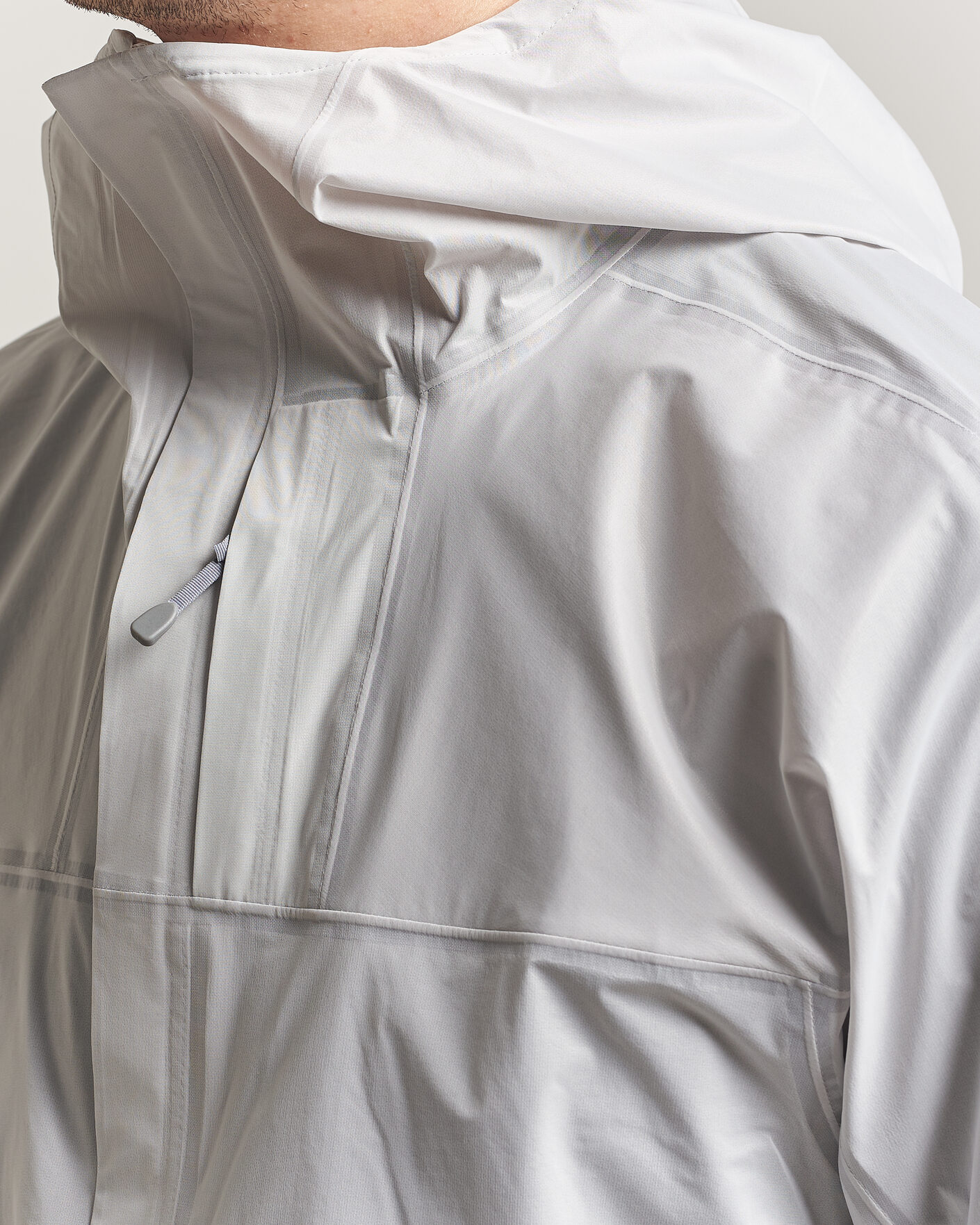 Mies | Takit | Houdini | The Orange Waterproof Jacket Powderday White