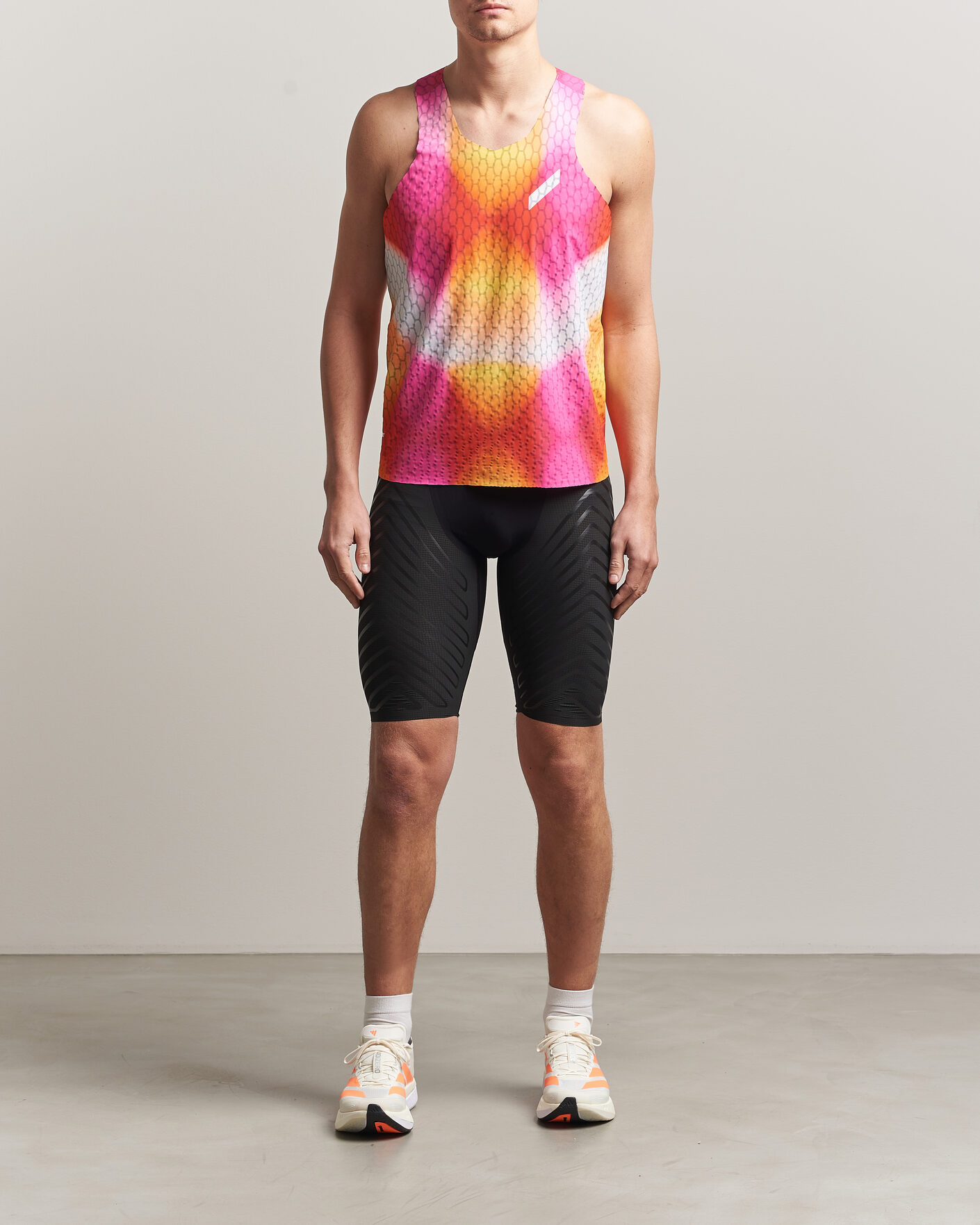 Mies | T-paidat | SOAR Running | Graphene Race Vest Red/Orange